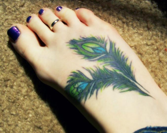 feather Tattoo on foot  by Blackshimmer