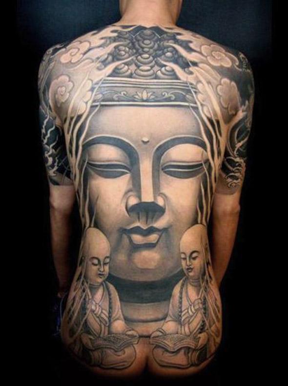 Buddha face tattoo