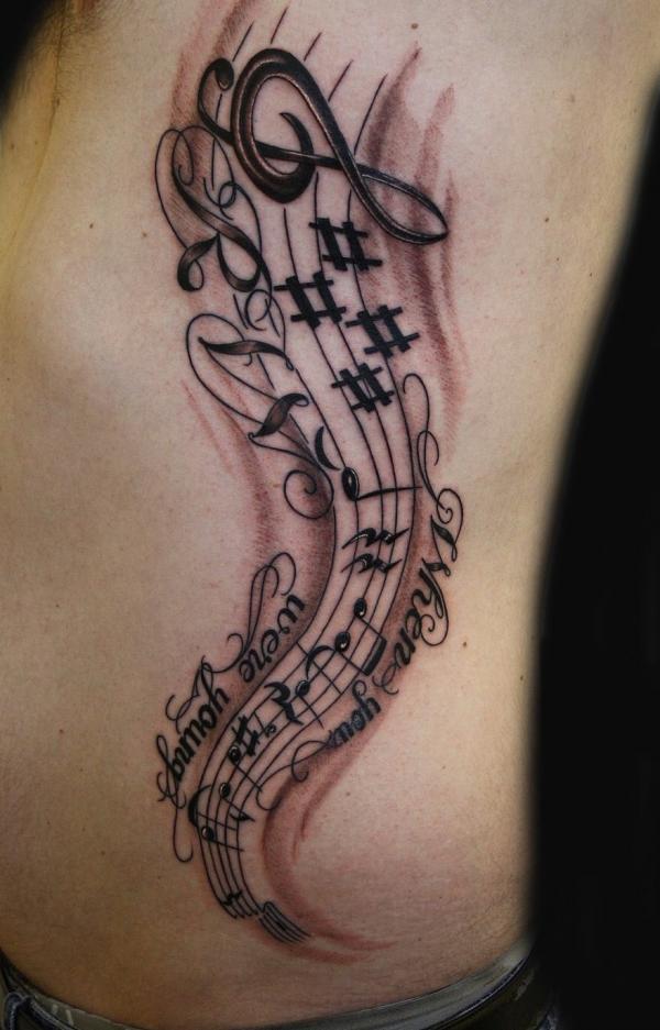 Music notes tattoo