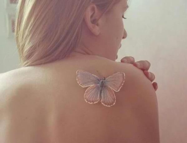 White ink  butterfly tattoo on back