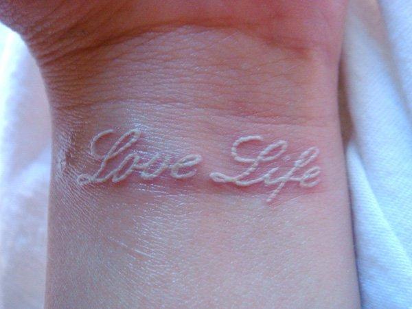 8 White ink  love life tattoo