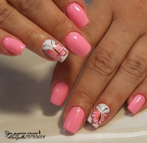 Cute looking pink and white butterflies nail art. This simple yet eye-catching nail art design is perfect for those who want a minimalist ef...
