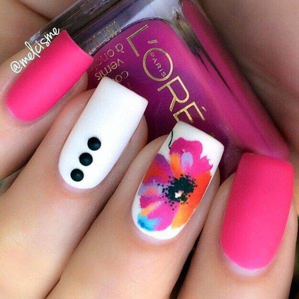 Pink and white is a refreshing color for nail polish especially in matte. But add this wonderful flower design and it just makes everything ...