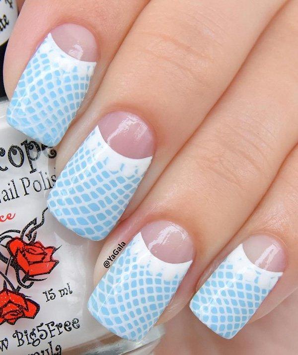 Here’s a little mermaid (just because it looks like fish scales) nail art design for you in sky blue and white.