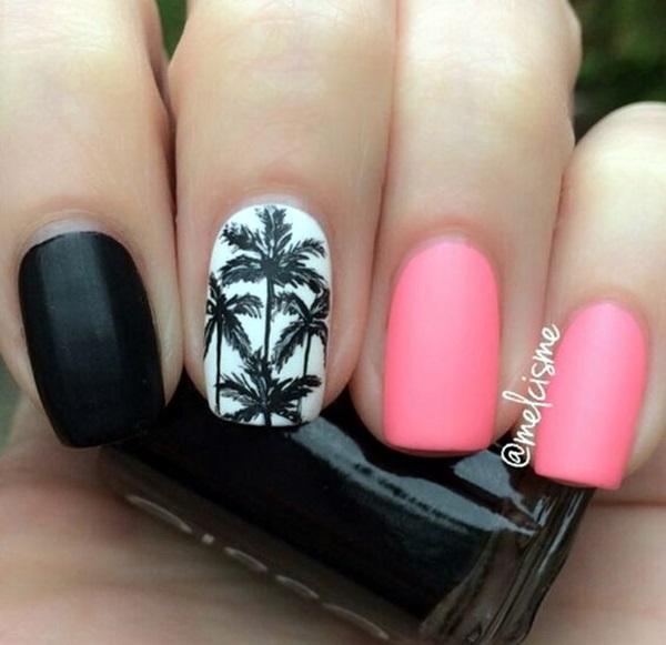 Simplistic Palm Tree Nail Art design. Matte pink and black colors are used on the other nails while there is a lone nail with white backgrou...