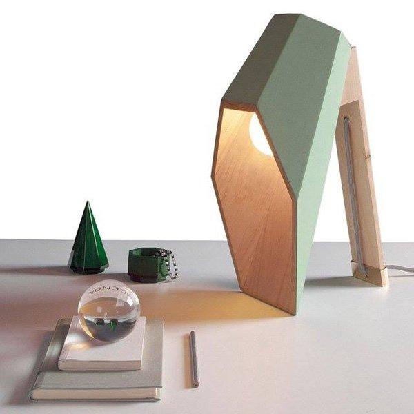 Wooden desk lamp. The homey design and the abundant lighting the lamp offers make it a perfect study lamp.