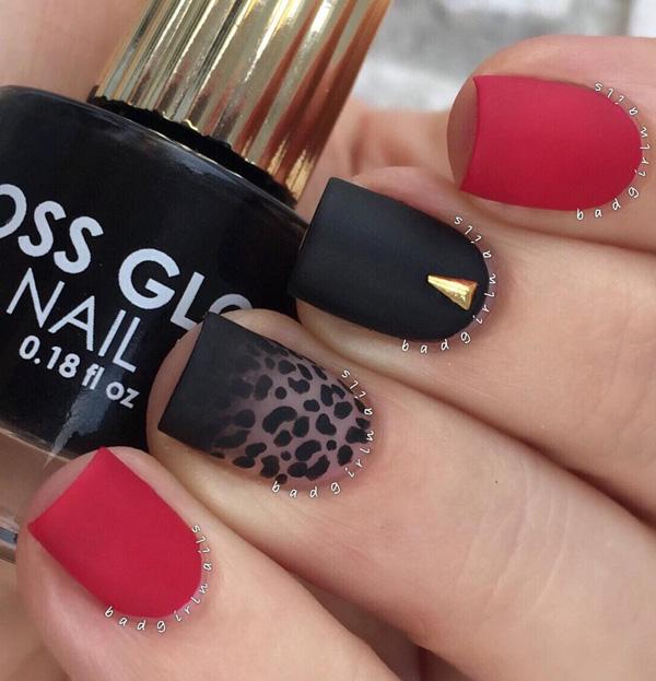 A fierce looking leopard nail art design. You can look at this design and definitely tell that it has a strong impact with its bold black an...