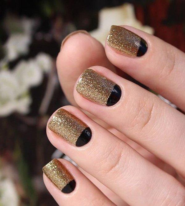 If you want to look a bit elegant for a special day, you could choose to go with full on gold glitters. Then have some black half moon desig...