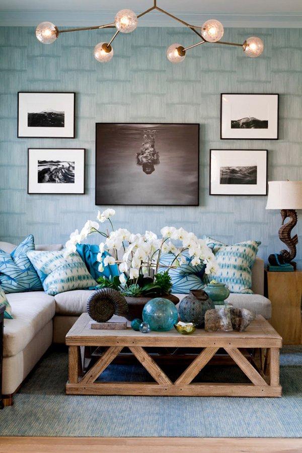 The blue tone is all over the house; in the wall and the pillows and even some of the decorations. There’s the wooden center table and a uni...