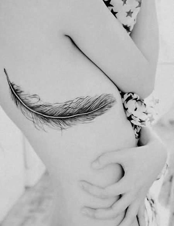 Feather rib tattoo for women