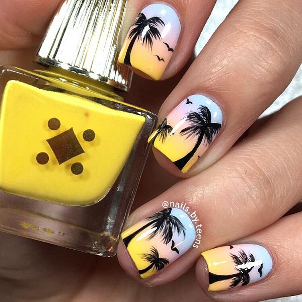Pretty Palm Tree Nail Art design. The skies are painted in soft morning colors with hints of yellow. The palm trees and the birds are seen i...