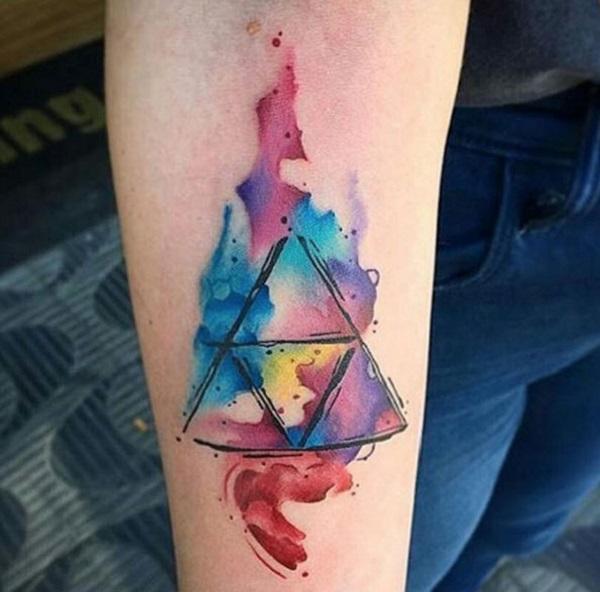 Watercolor inspired Triangle Glyph Tattoo. As the symbols are being drawn within the triangle, you can see that the colors are slowly spilli...