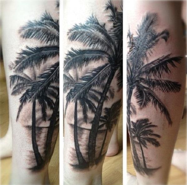 Grayscale beach tattoo of palm trees. Beautiful and enthralling at the same time. The design gives the beach a wonderful pure look as the su...