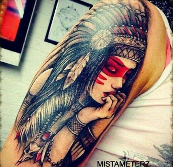 A girl with a headdress, a native American inspired sleeve tattoo in Gothic style.