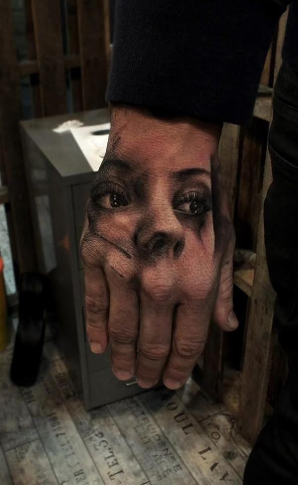 Hand Portrait Tattoo