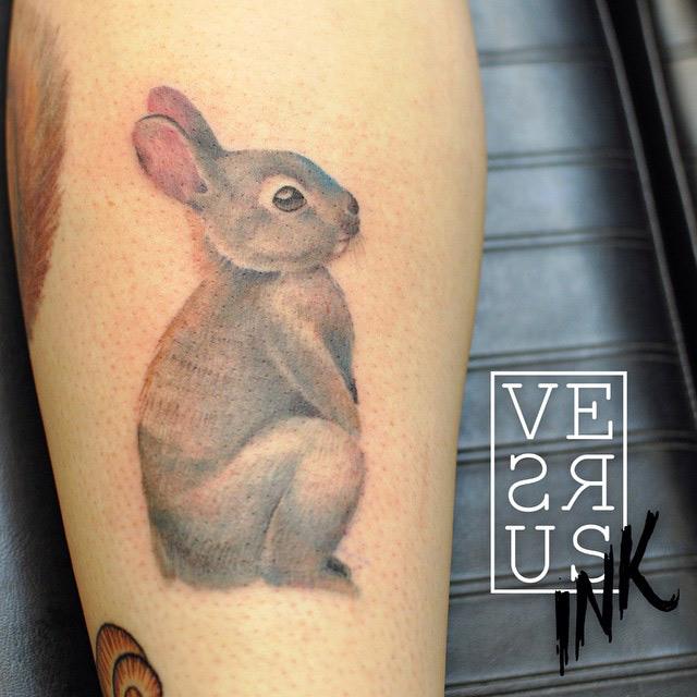 Tattoo uploaded by Tattoodo • Bunny tattoo by Sol Tattoo #SolTattoo # bunnytattoo #watercolor #painterly #illustrative #linework #fineline # realistic #bunny #rabbit #flowers #poppies #nature #animal • Tattoodo