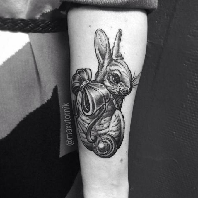Rabbit tattoo on arm