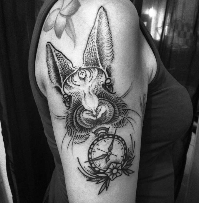Rabbit tattoo with clock