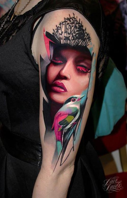 Abstract portrait & bird tattoo done by Dave Paulo