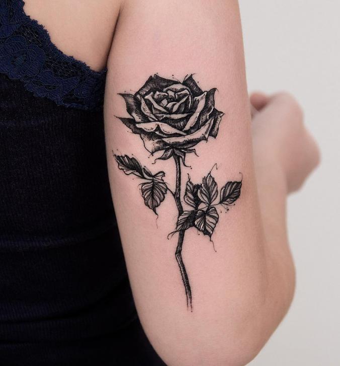 Rose tattoo on sleeve 