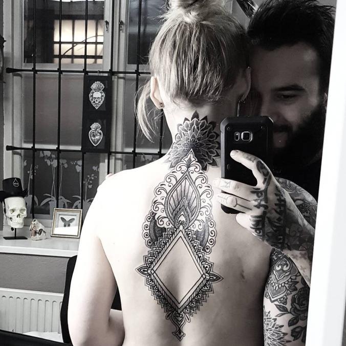 Mandala back tattoo