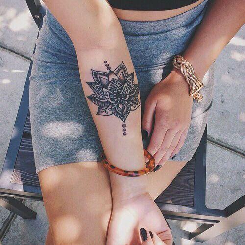 lotus mandala tattoo on forearm