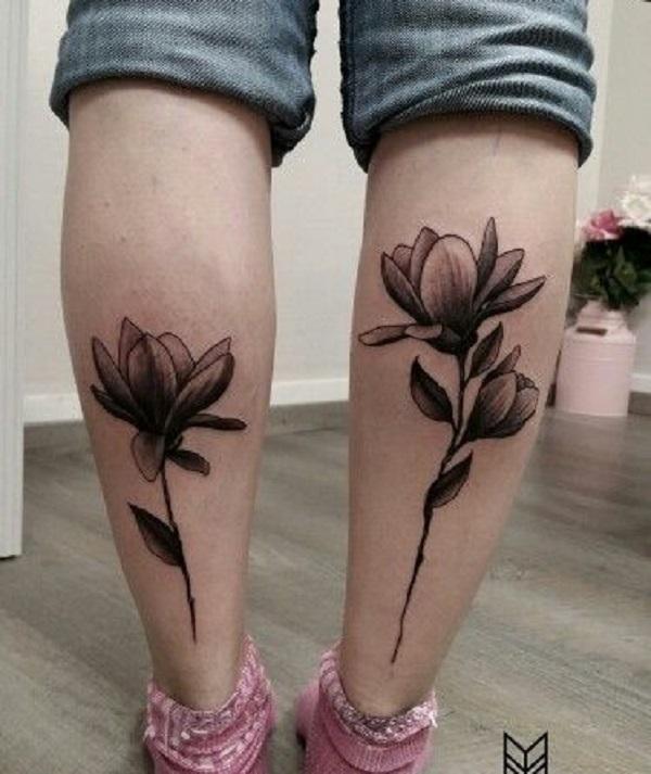 Twin Magnolia Flower Tattoos for calf. Bold girls love to place their tattoos on their calves. These twin tattoos of magnolia flowers would ...