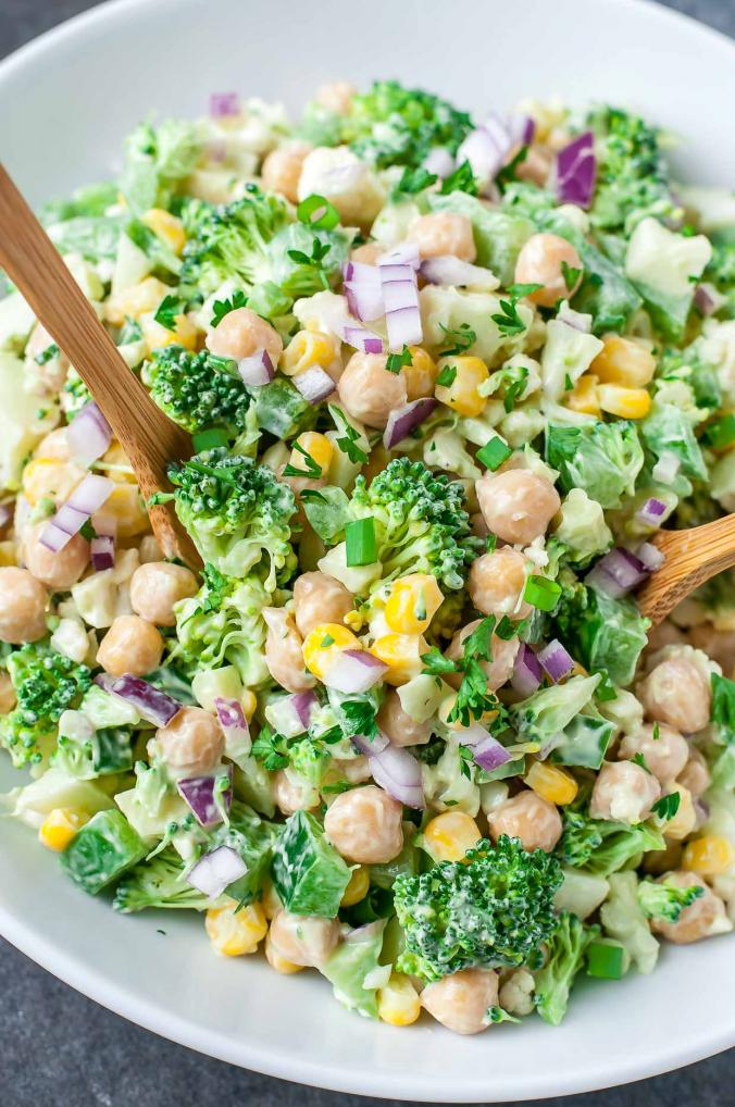 Featuring a tasty medley of broccoli, cauliflower, corn, and chickpeas, this chopped cauliflower broccoli salad with creamy avocado dressing...