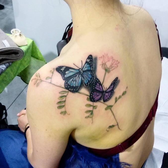 Butterfly....coverup and botanical tattoo