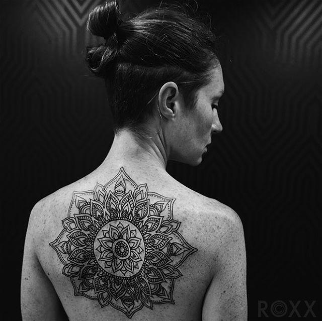 Mandala back tattoo