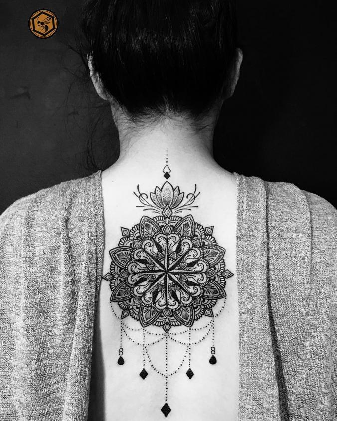 Mandala compass with chandelier tattoo