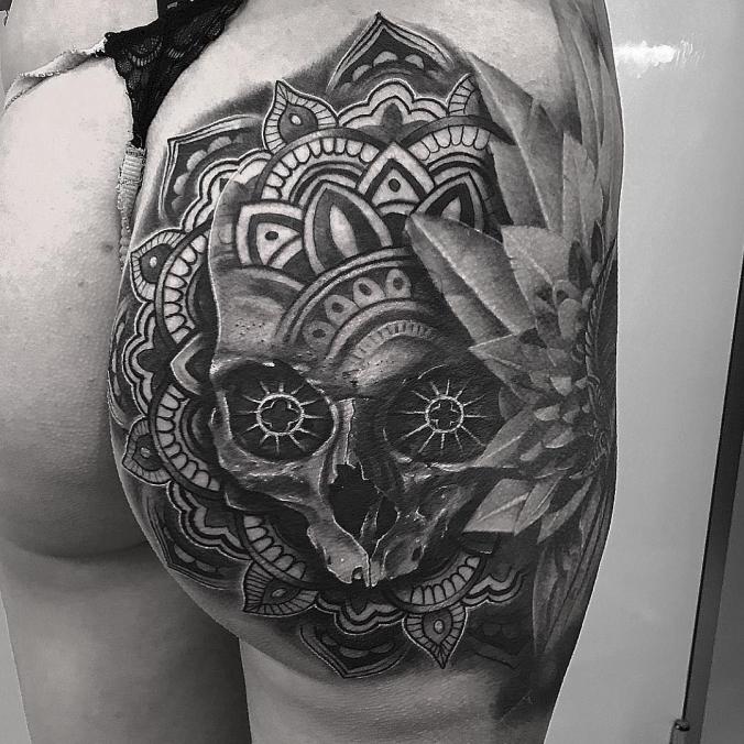 Mandala with skull tattoo