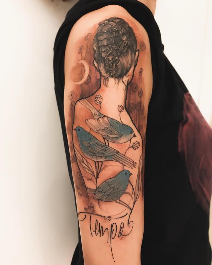 Amazing girl with birds sleeve tattoo