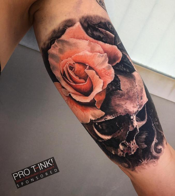 Skull and rose tattoo
