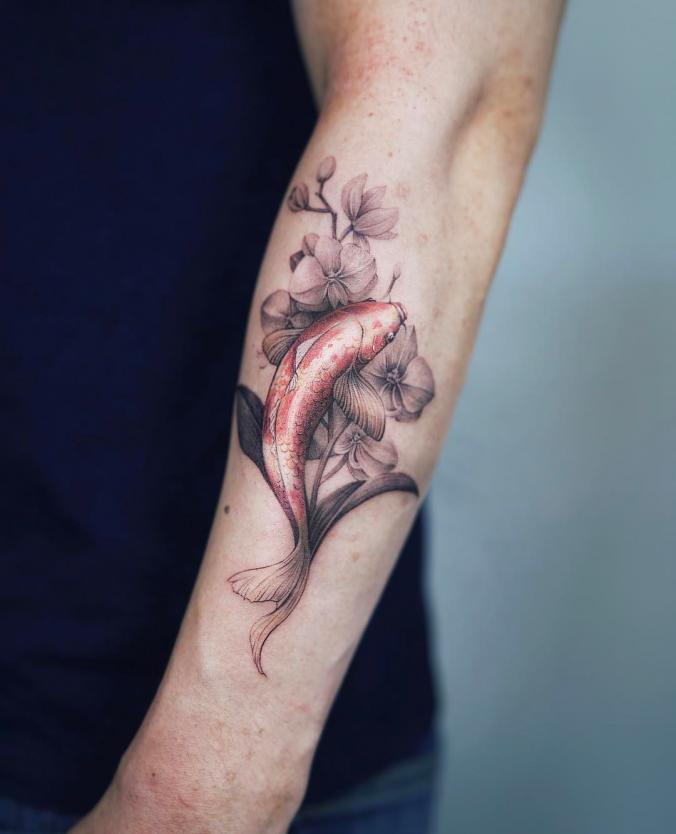 Fish and flower tattoo