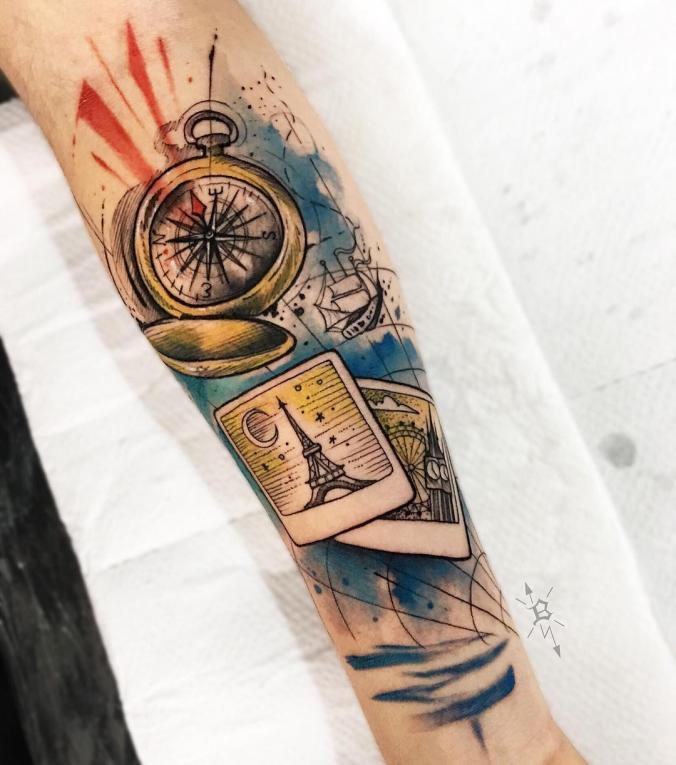 Watercolor compass sleeve tattoo