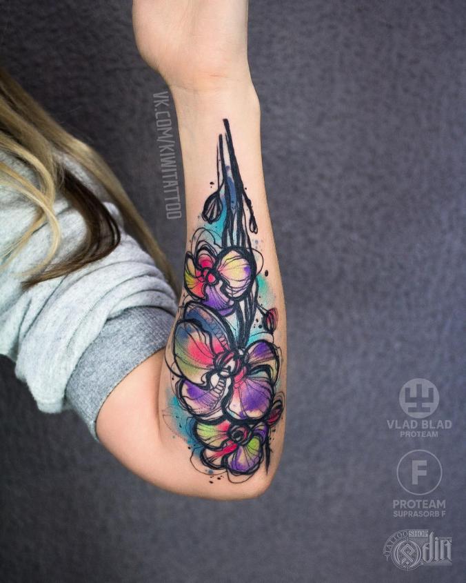 Watercolor flower sleeve tattoo
