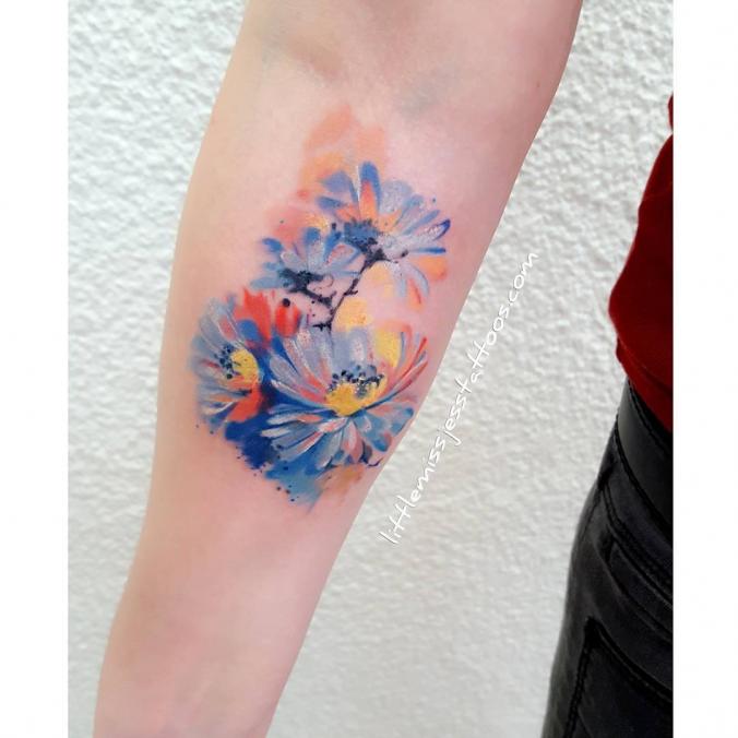 Amazing watercolor flower tattoo