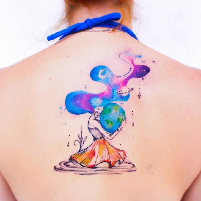 Watercolor back tattoo