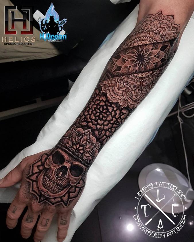 Mandala  hand and forearm tattoo