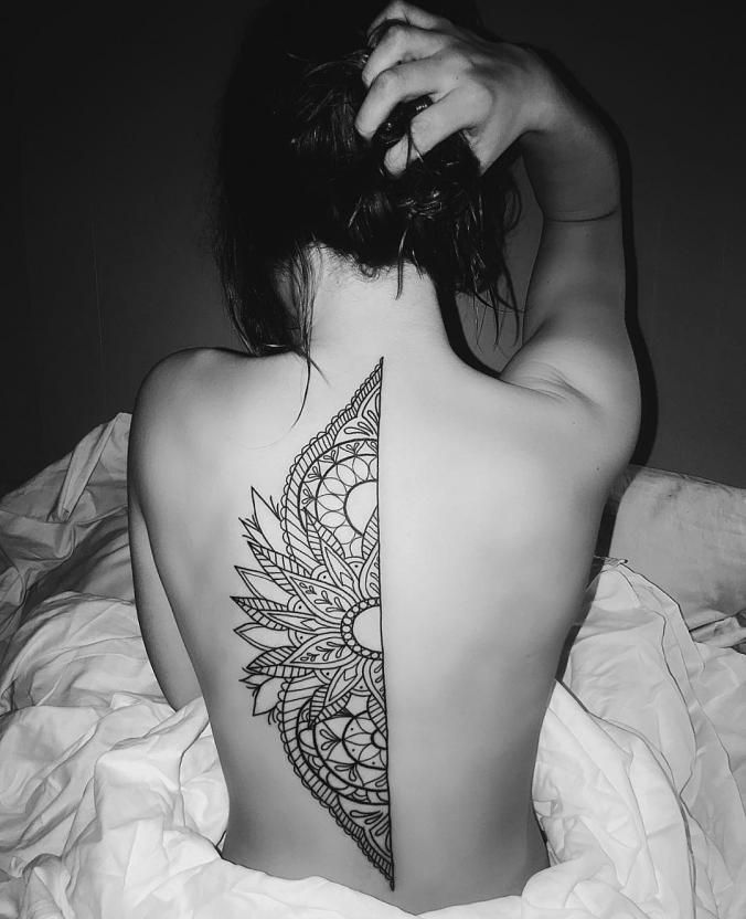 Amazing mandala back tattoo