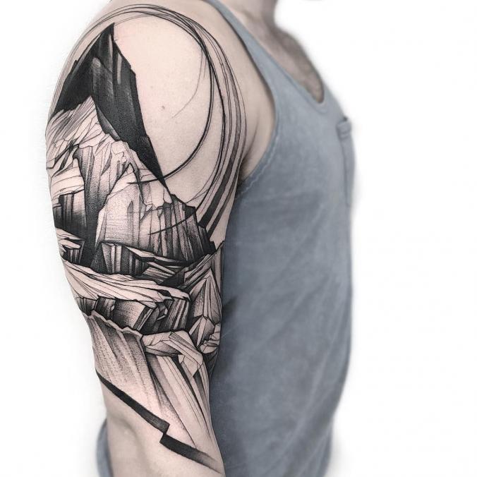 Landscape sleeve tattoo