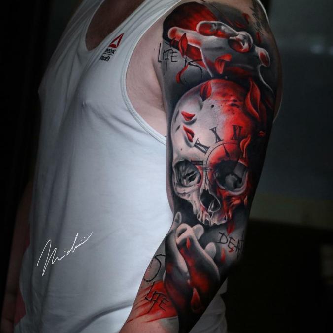 Skull sleeve tattoo