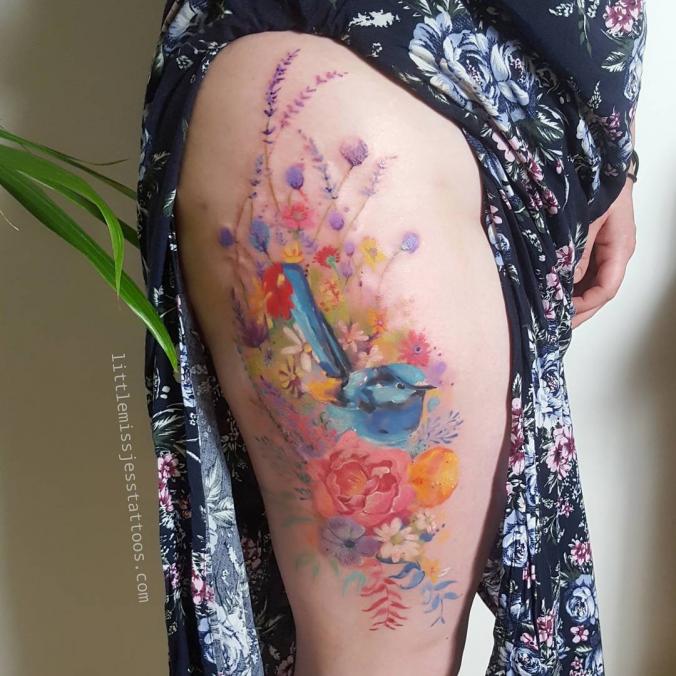 Bird and flower tattoo