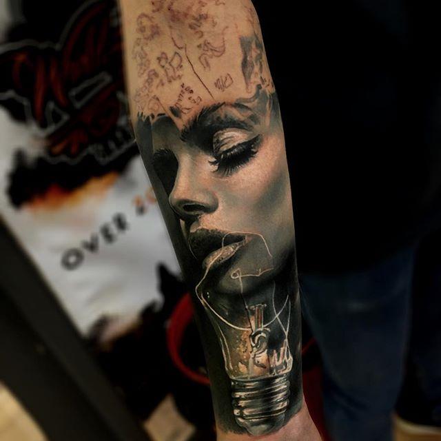 Women face and bulb sleeve tattoo