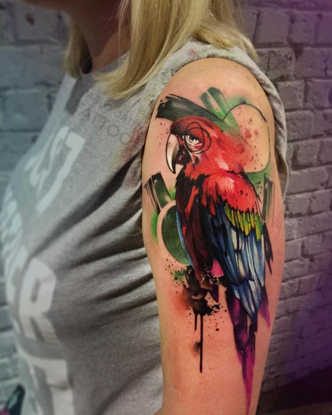 Parrot tattoo by Pablo Ortiz