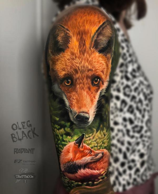 Colorful fox tattoo on arm in D stle