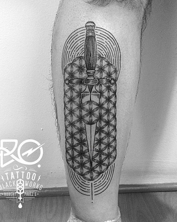 sword leg tattoo