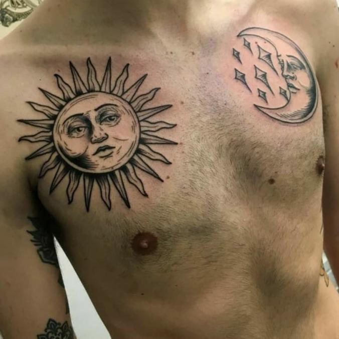 Sun and moon chest tattoo for men