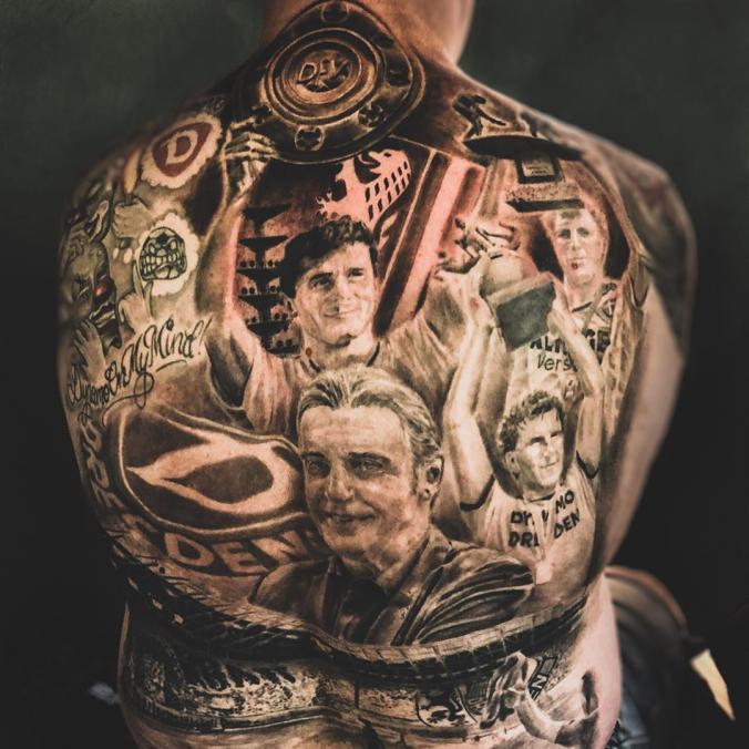 dynamo full back tattoo by Dobermann Tattoo 